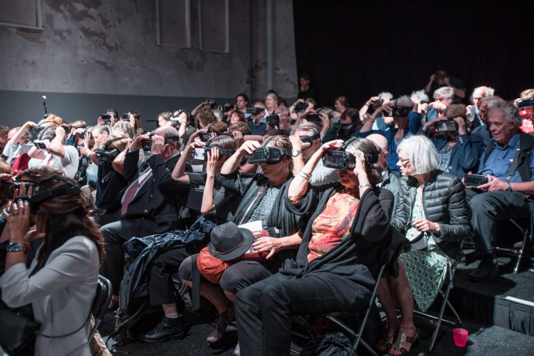 audience wearing vr headsets