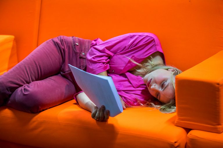 woman laying on a couch